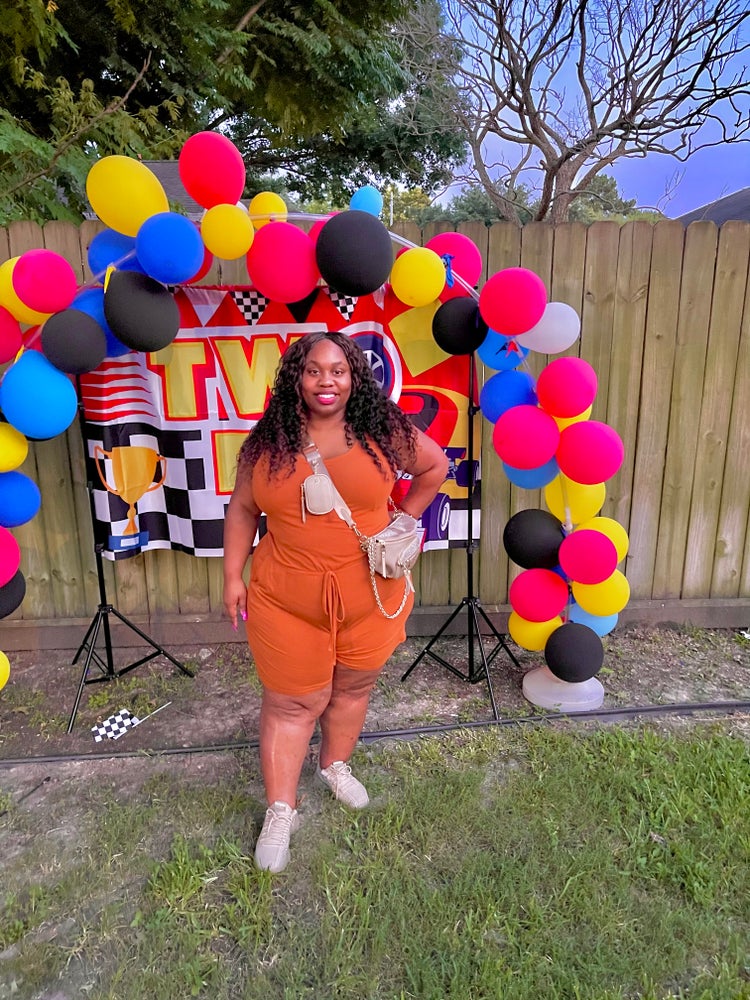 BURNT ORANGE PLUS SLEEVELESS ROMPER WITH POCKETS